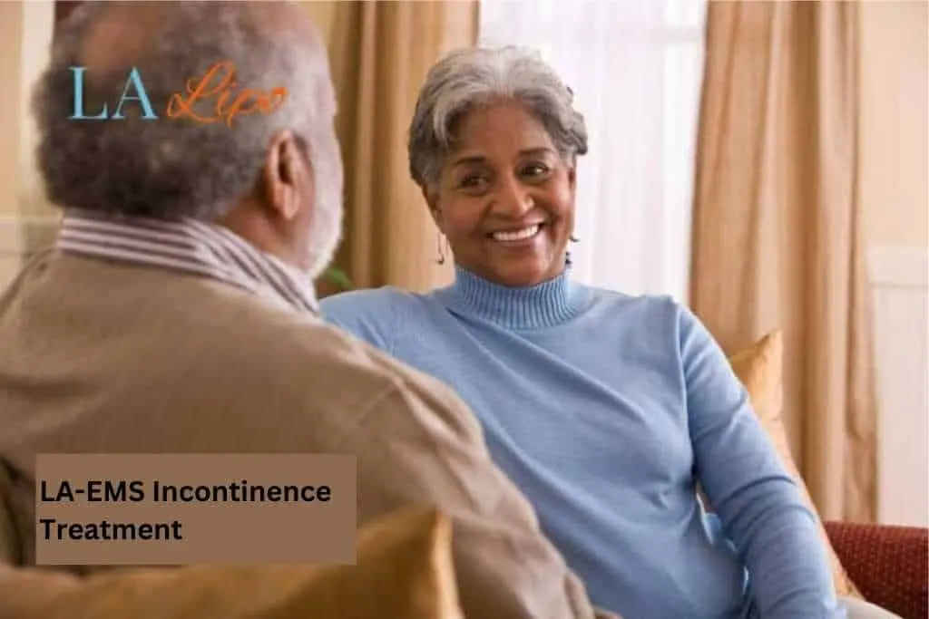 Couple sat smiling at each other - LA-EMS treatment Lichfield