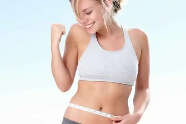 woman happy after fat reduction treatment Lichfield