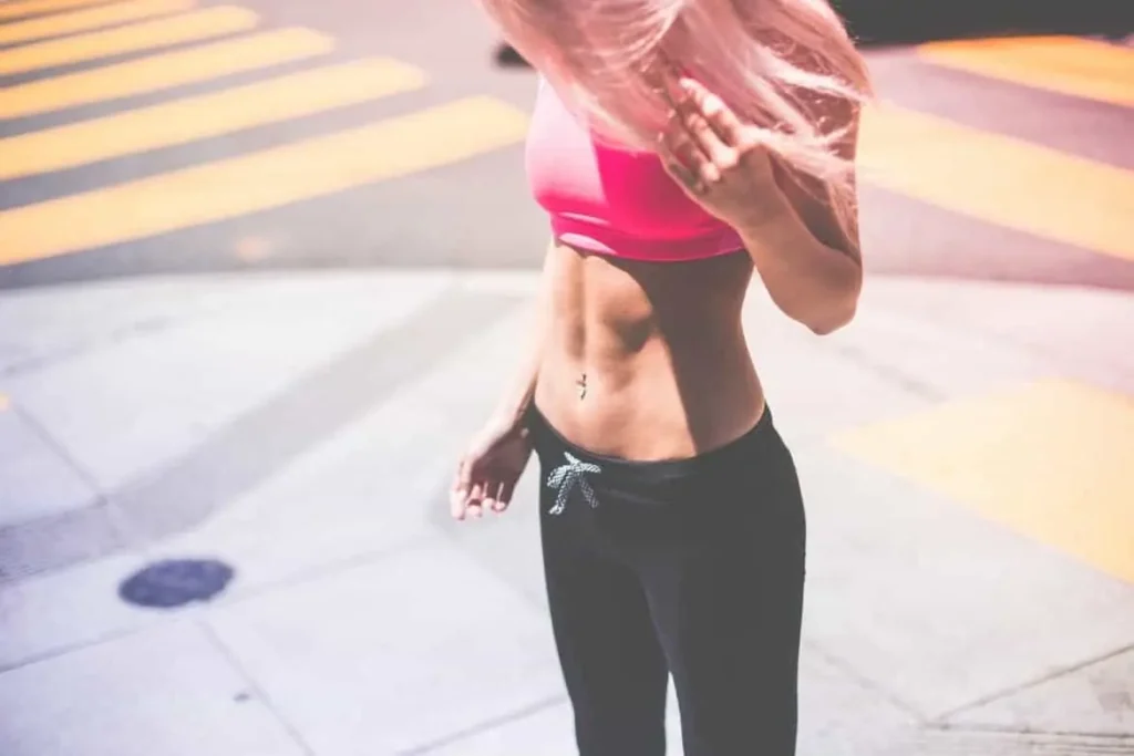 Woman with toned stomach after LA-EMS Body Sculpting Treatment Lichfield